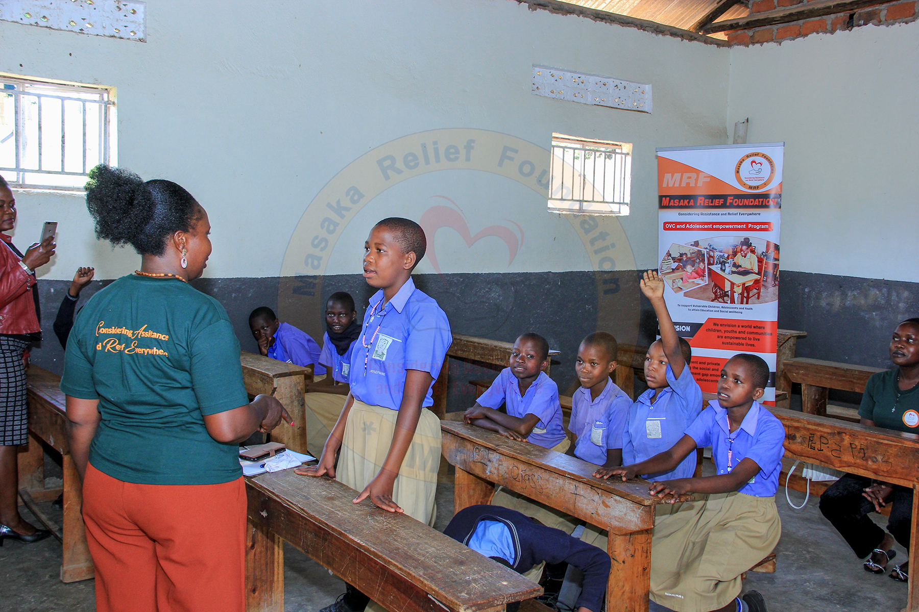 MRF staff conducting education outreach in a primary school classroom